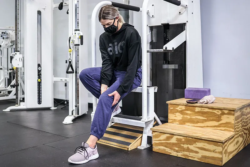 women using workout machine