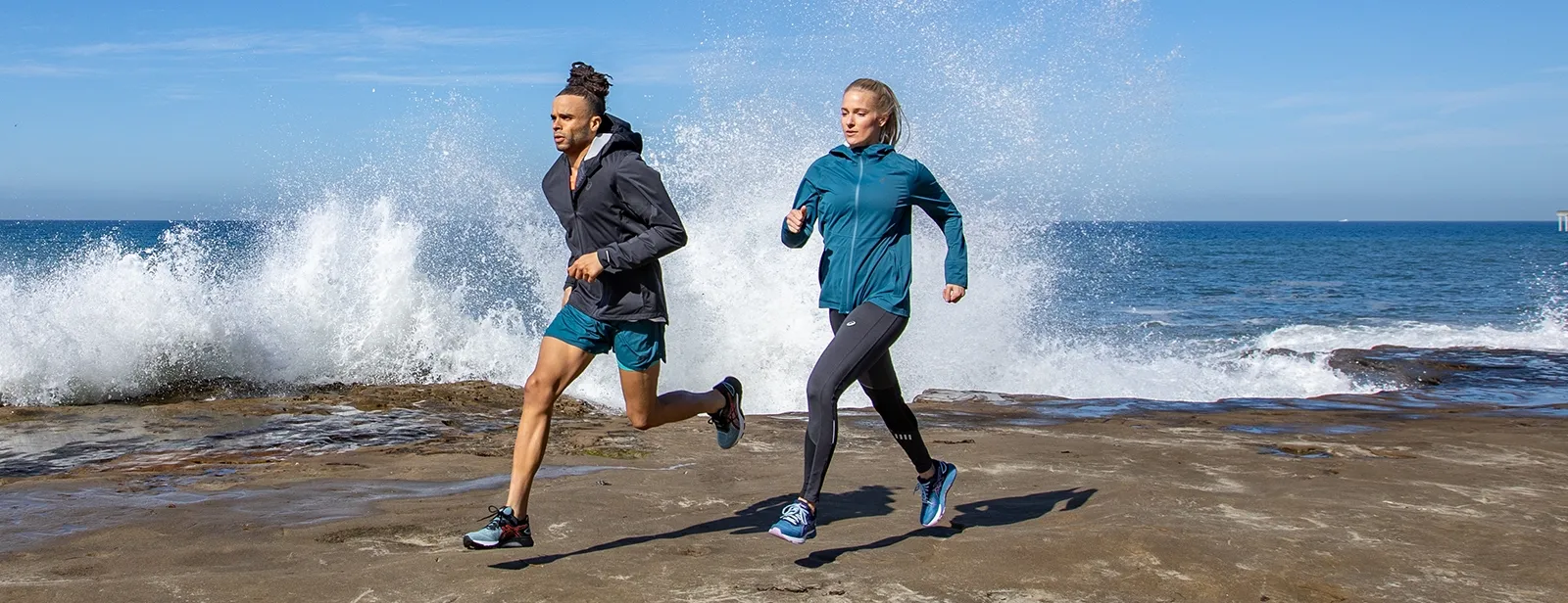 Man and Woman running outdoors