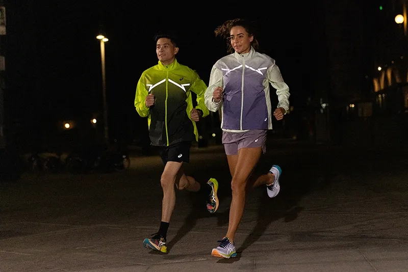 Two people running together