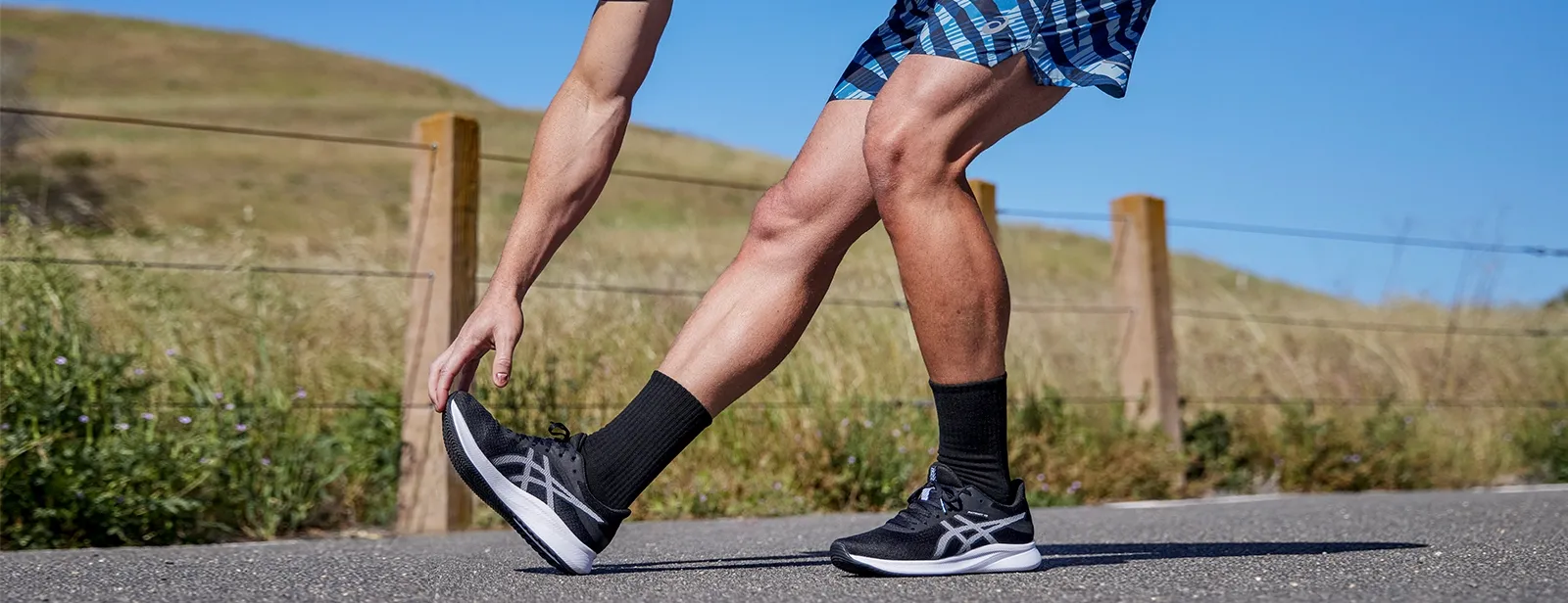 Person streching there calf and foot