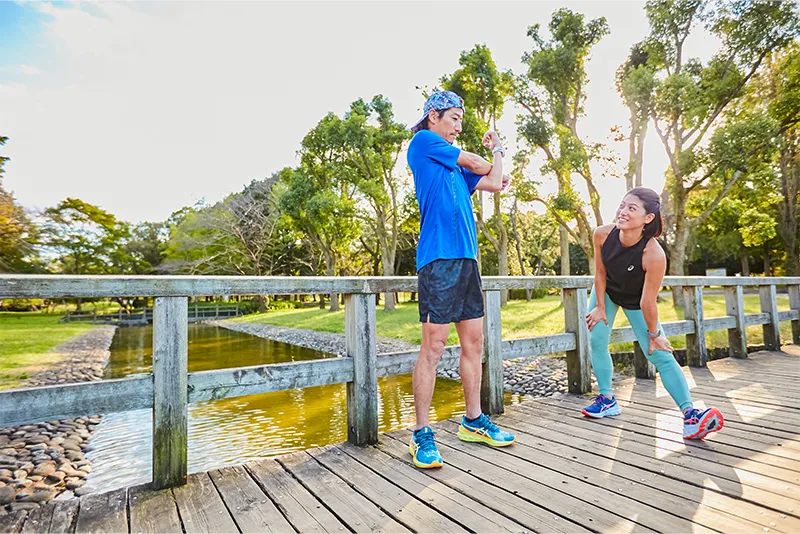 Two People running outdoors