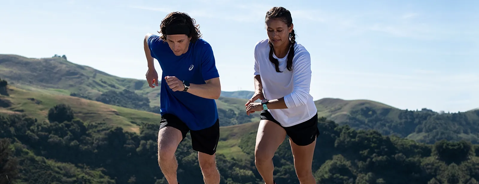 2 people running outdoors