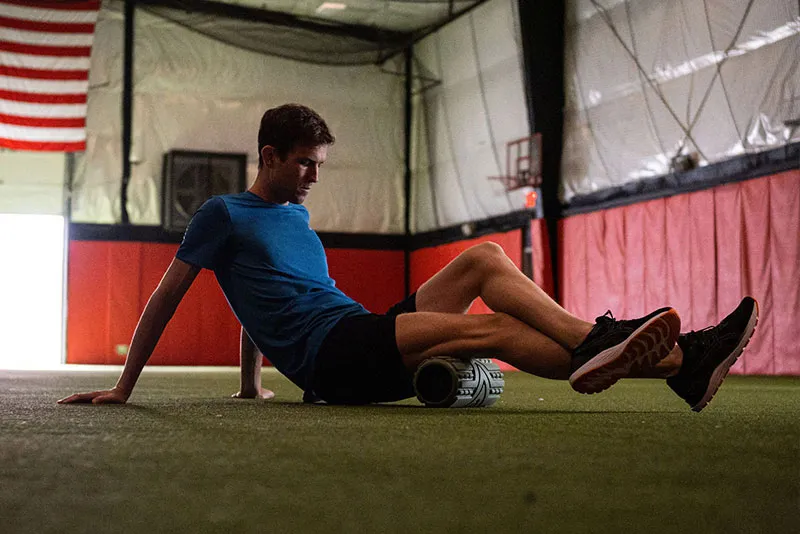 Man foam rolling