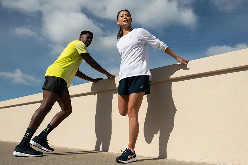 Man and woman warming up outdoor