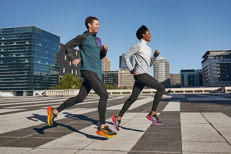Two people running