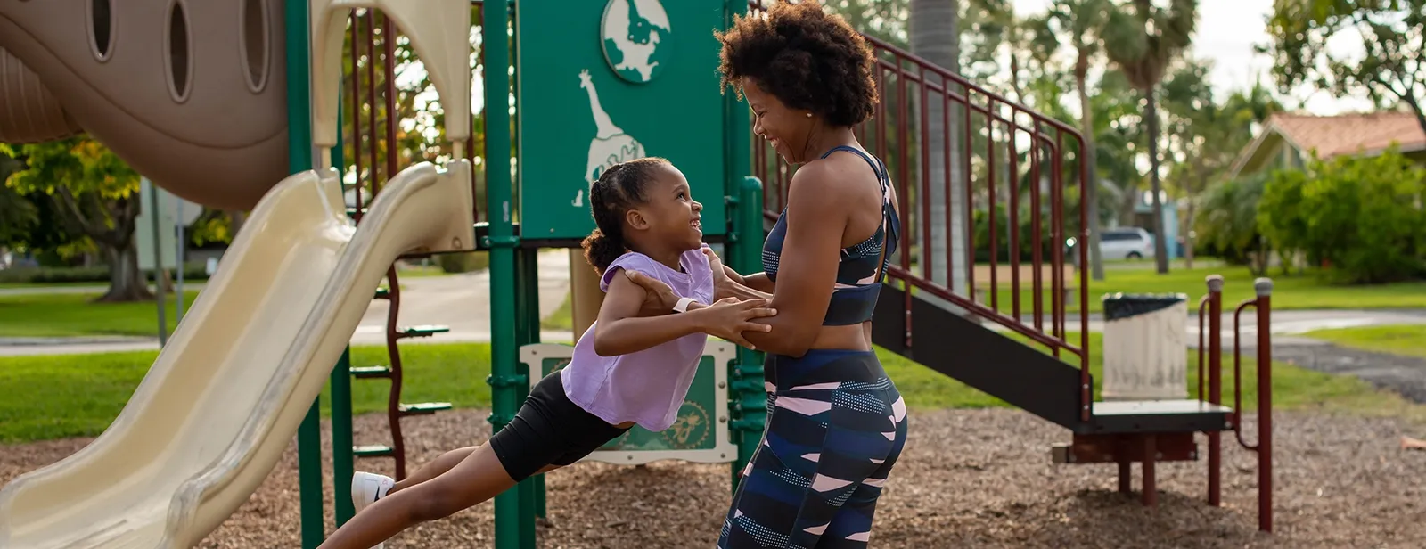 Women and child at a playground