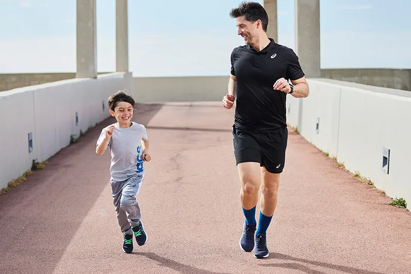 Son and dad running together