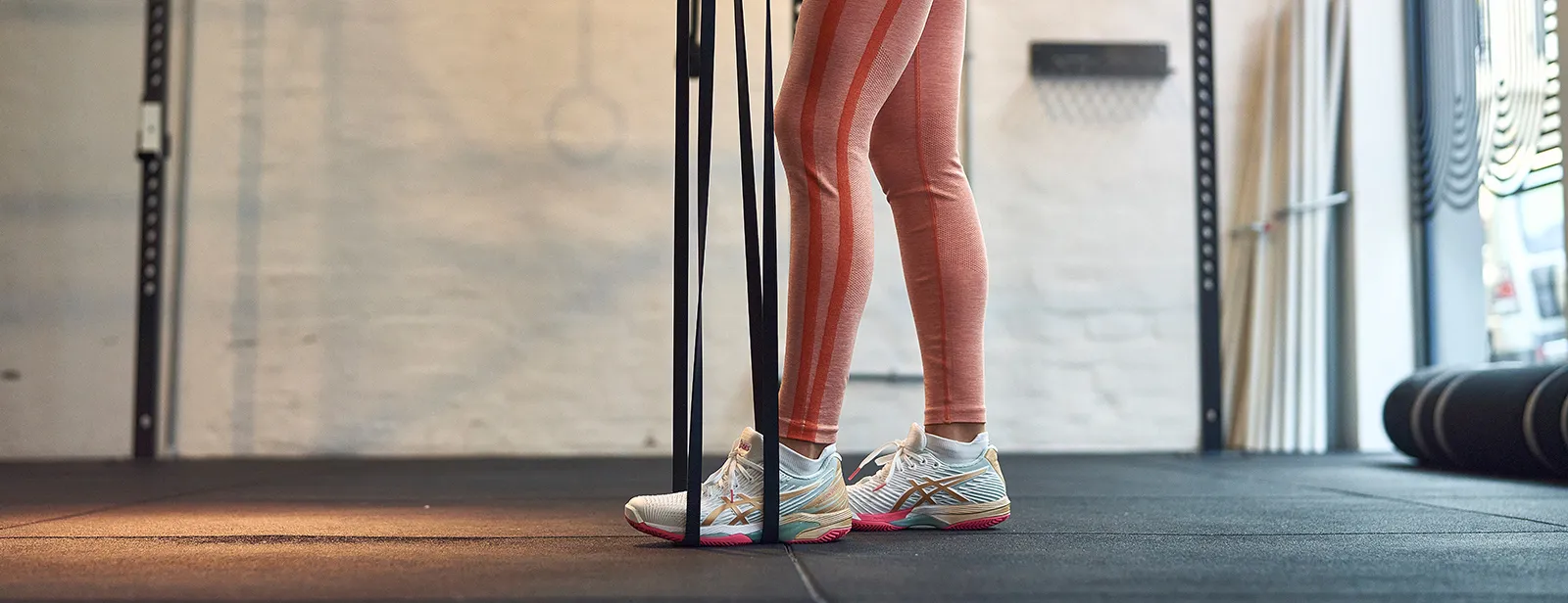 woman using resistance band