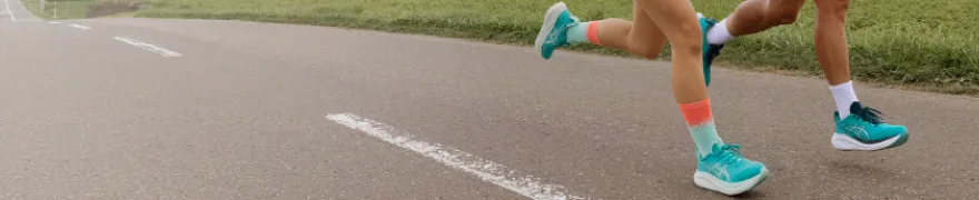 ASICS Athletes running while wearing the Gel-Nimbus 27.
