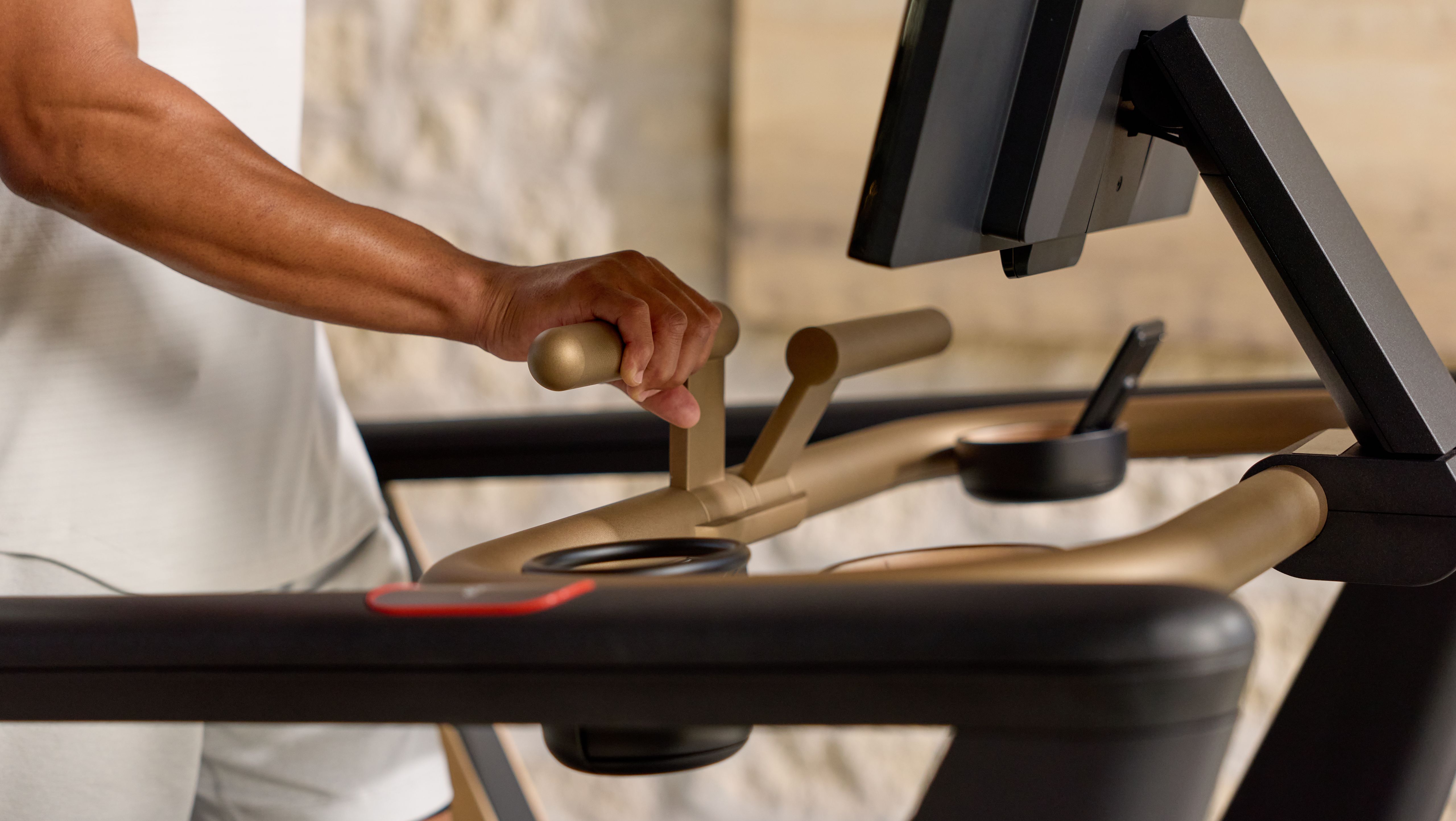Close-up of a treadmill speed and incline controls