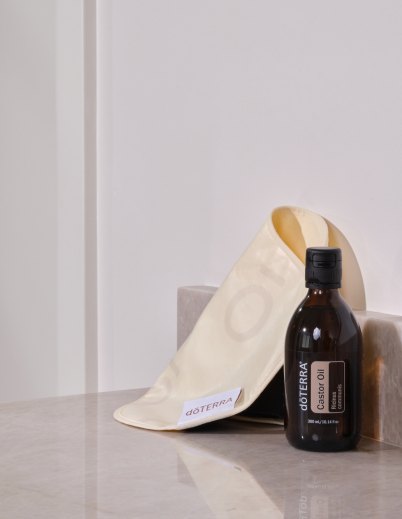 dōTERRA Castor Oil and ready-to-use Castor Oil Pack body wrap