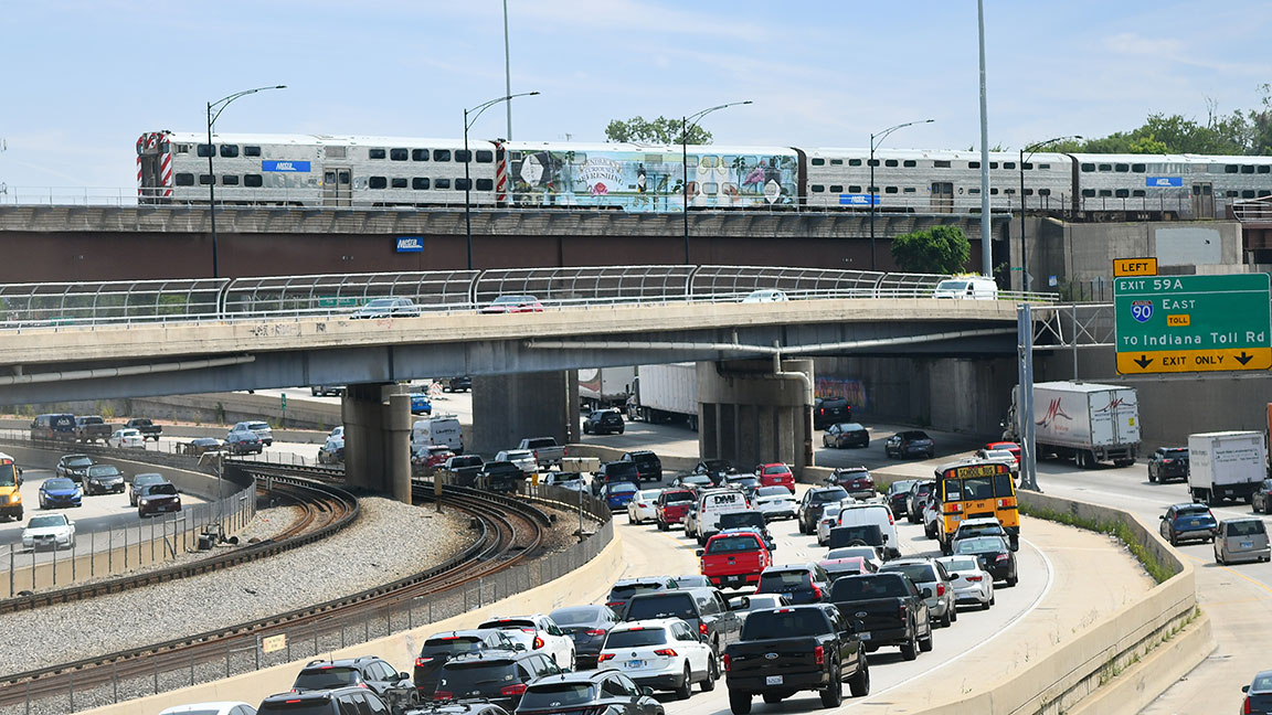 Wrapped Metra train passes over I-94 in Chicago