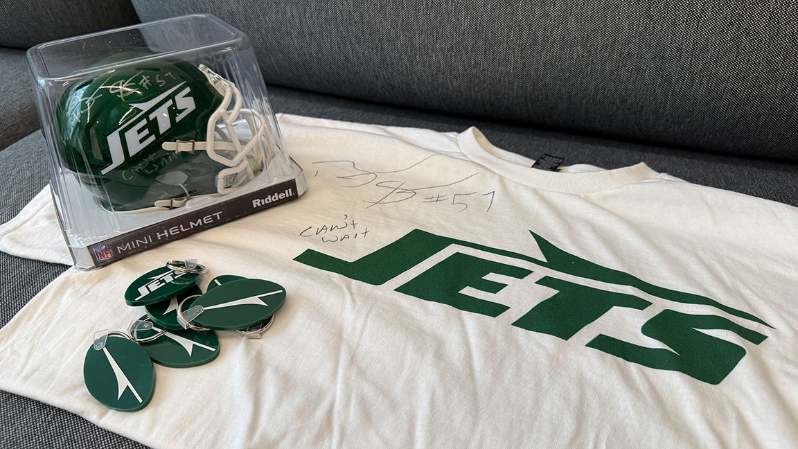 Keychains, signed helmets, and signed T-shirt for NY Jets activation
