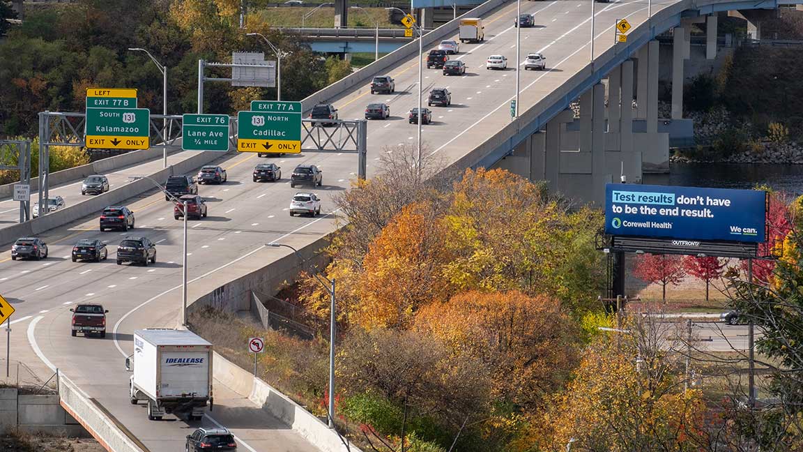 Corewell Health billboard alongside freeway