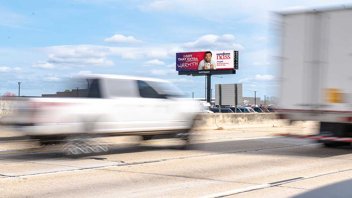 OUTFRONT STUDIOS x NDSS “I Got That Extra” campaign for National Down Syndrome Awareness Week featuring Angad Sahgal on digital billboard in New Orleans
