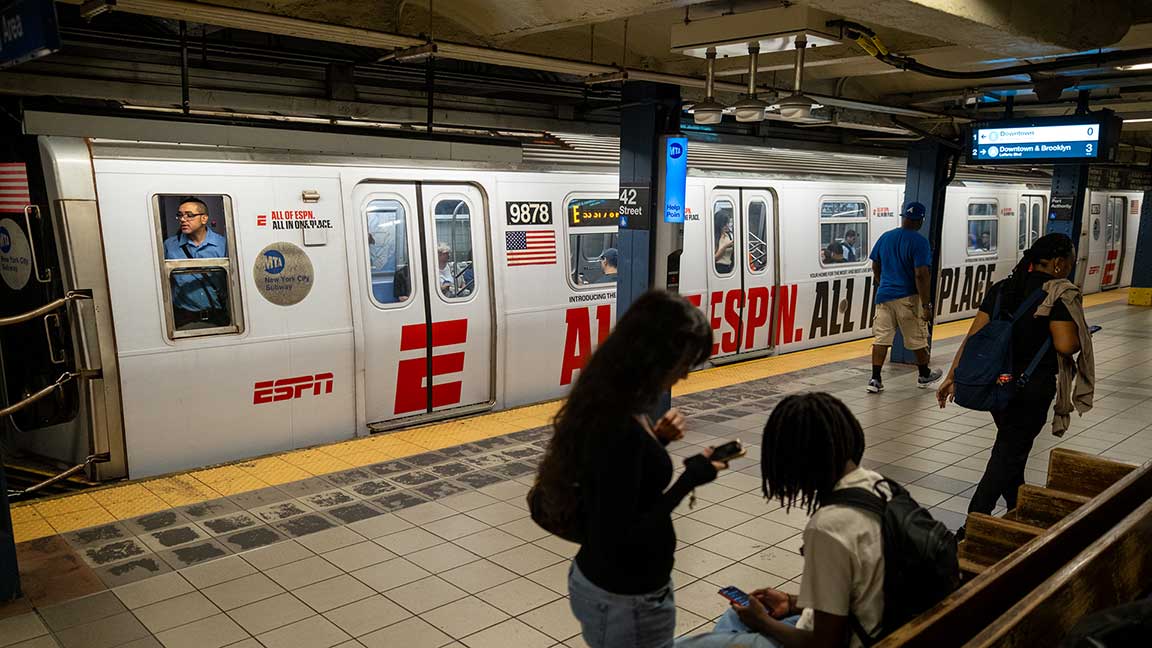 ESPN wrapped E train at 42 Street/Port Authority Station