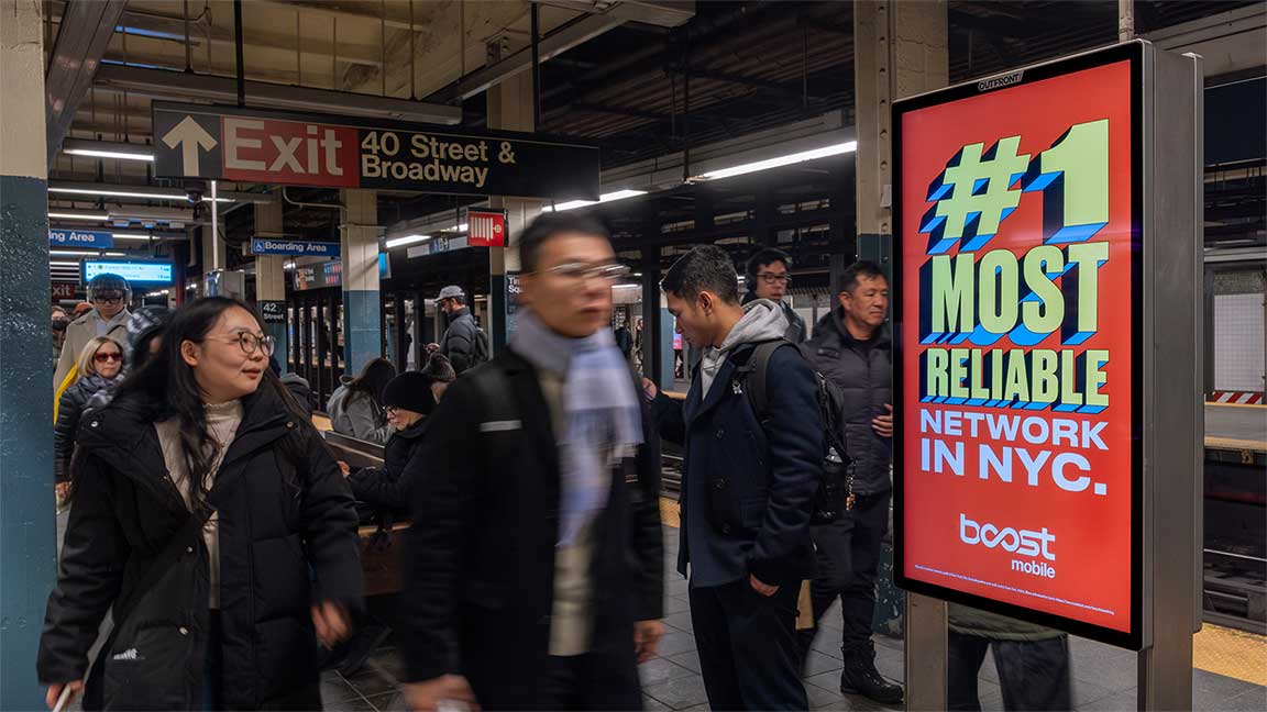 Liveboard DOOH advertisement for Boost Mobile in NYC’s Times Square-42nd Street subway station