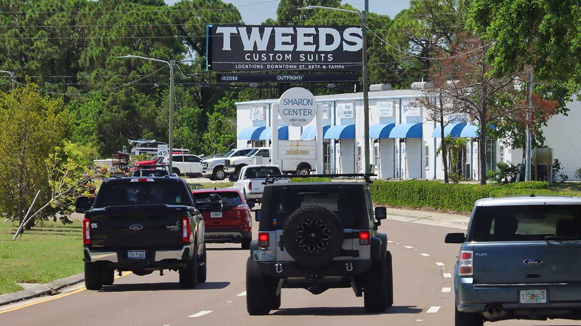 Tweeds Custom Suits billboard in Tampa
