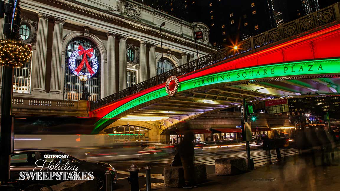Grand Central Terminal during the holidays, with OUTFRONT Holiday Sweepstakes logo