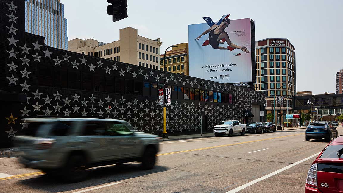Olympics-themed Xfinity bulletin with extensions, billboard in Minneapolis