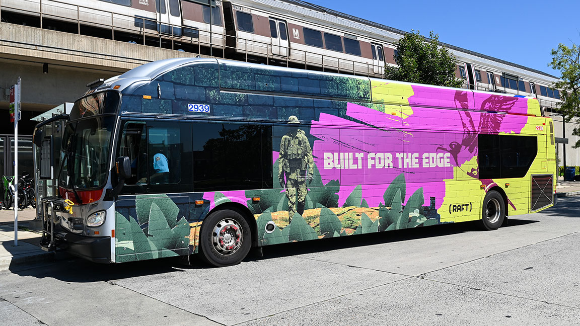Wrapped Washington D.C. Metrobus advertising Raft
