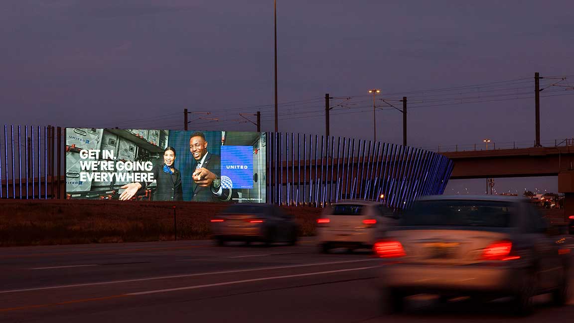 United Airlines digital billboard outside Denver International Airport