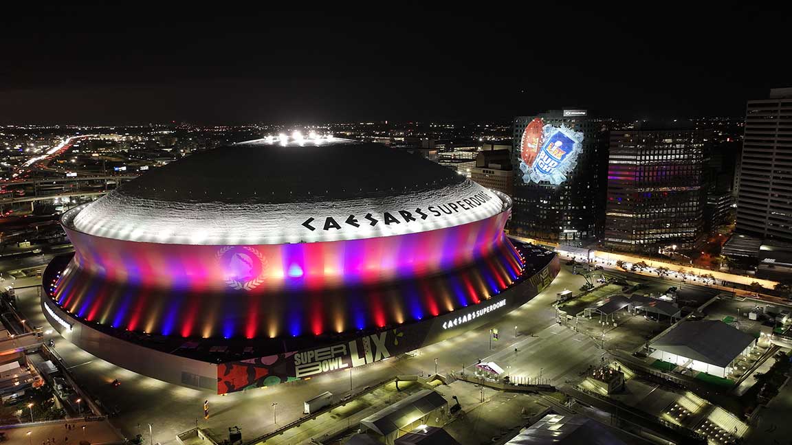 Bud Light building wrap next to Caesars Superdome in New Orleans for Super Bowl LIX