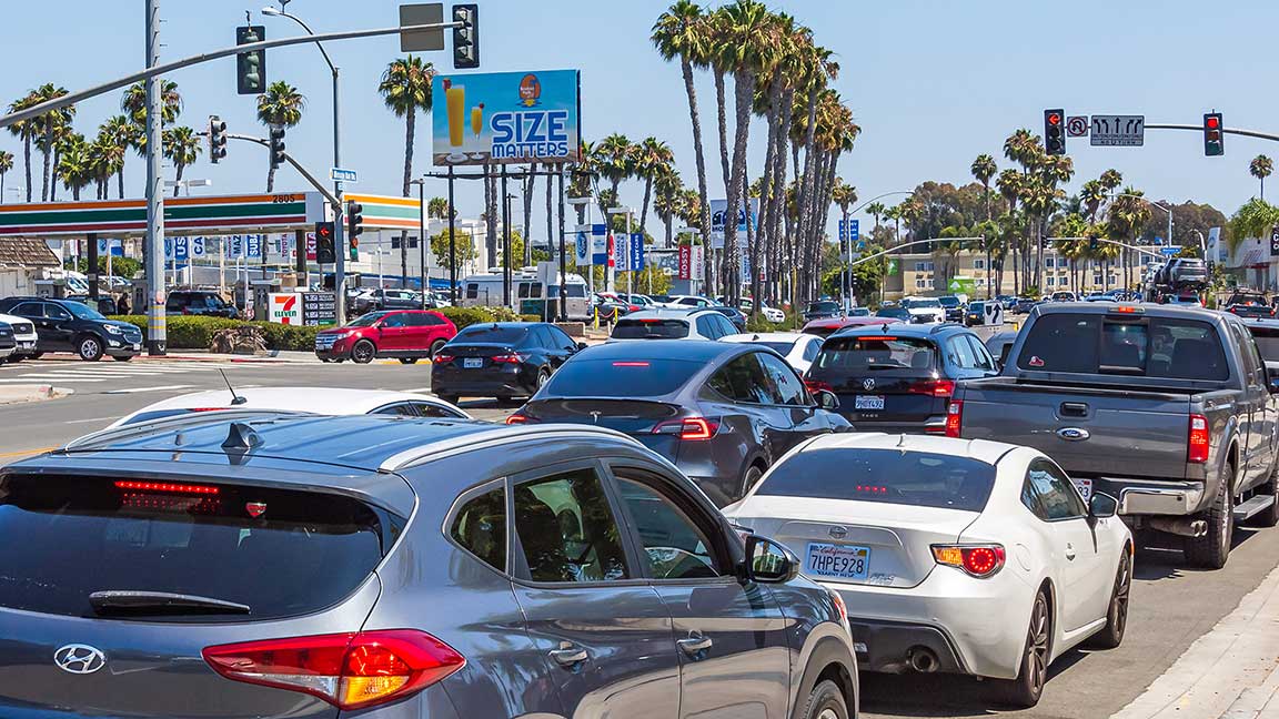 Poster billboard in San Diego for the Broken Yolk Café with the copy line “size matters”