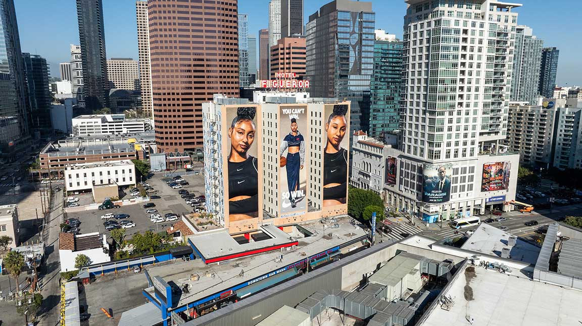 Nike OOH ad featuring JuJu Watkins hand-painted mural wallscape, Hotel Figueroa, Los Angeles