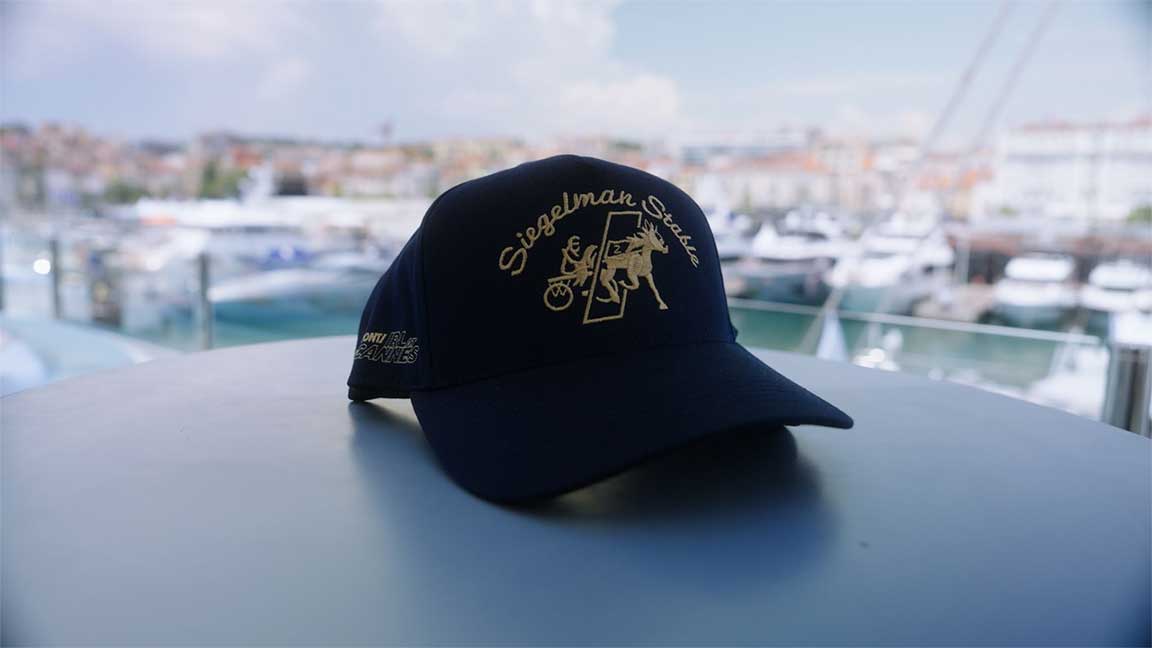 OUTFRONT x Siegelman Stables “IRL Drop” limited edition hat
