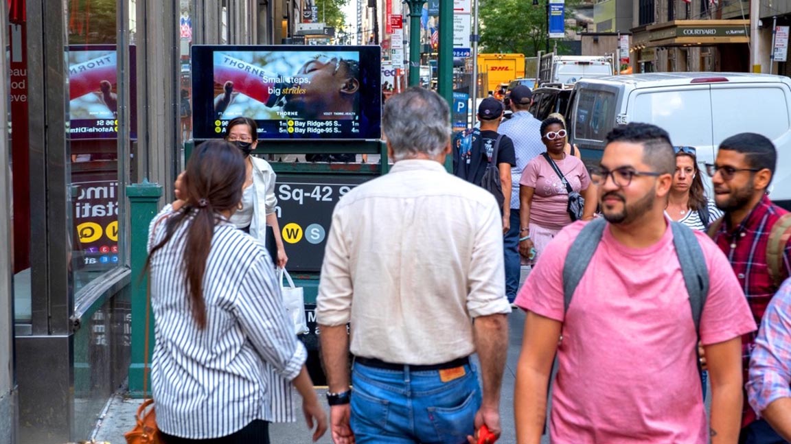 Video urban panel media atop subway entrance