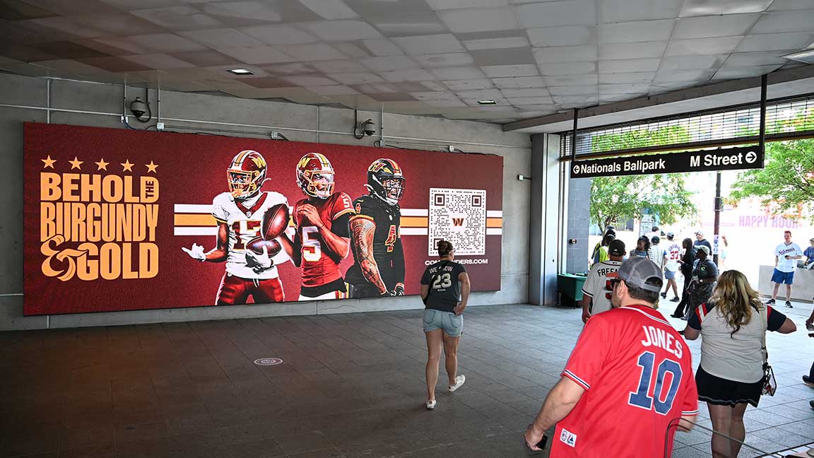 “Behold the Burgundy and Gold” Washington Commanders campaign on Digital Spectacular in D.C. Metro system