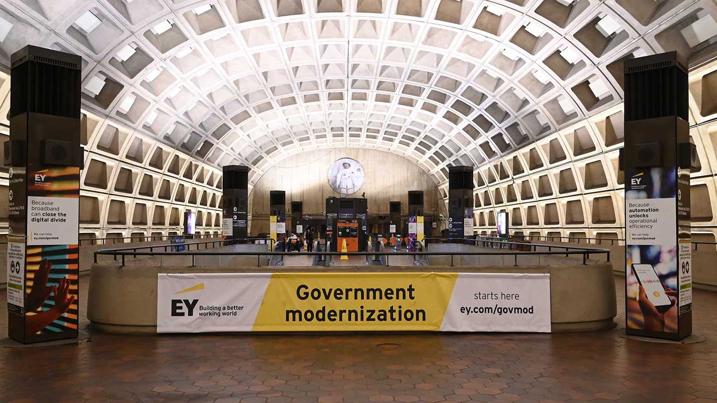 out of home transit station domination advertising EY washington DC