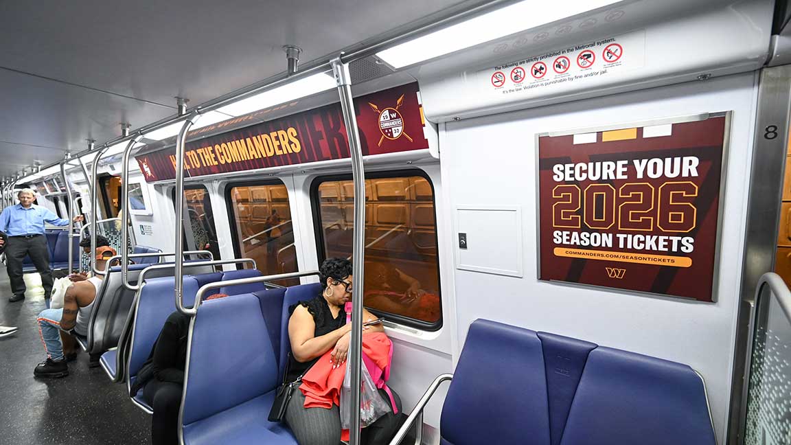 Washington Commanders brand train interior on D.C. Metro