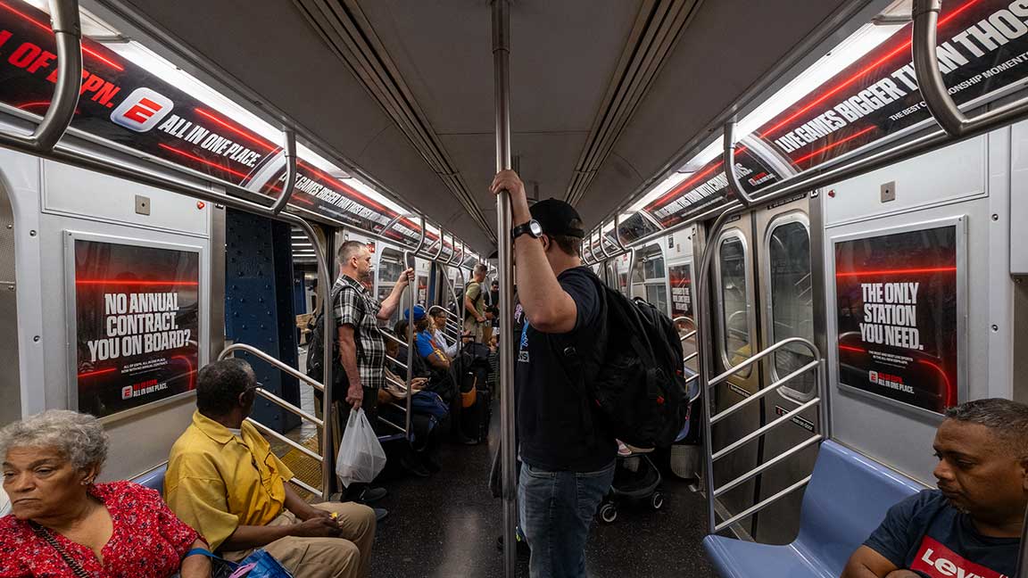 Interior brand train on wrapped ESPN Train New York City E subway line