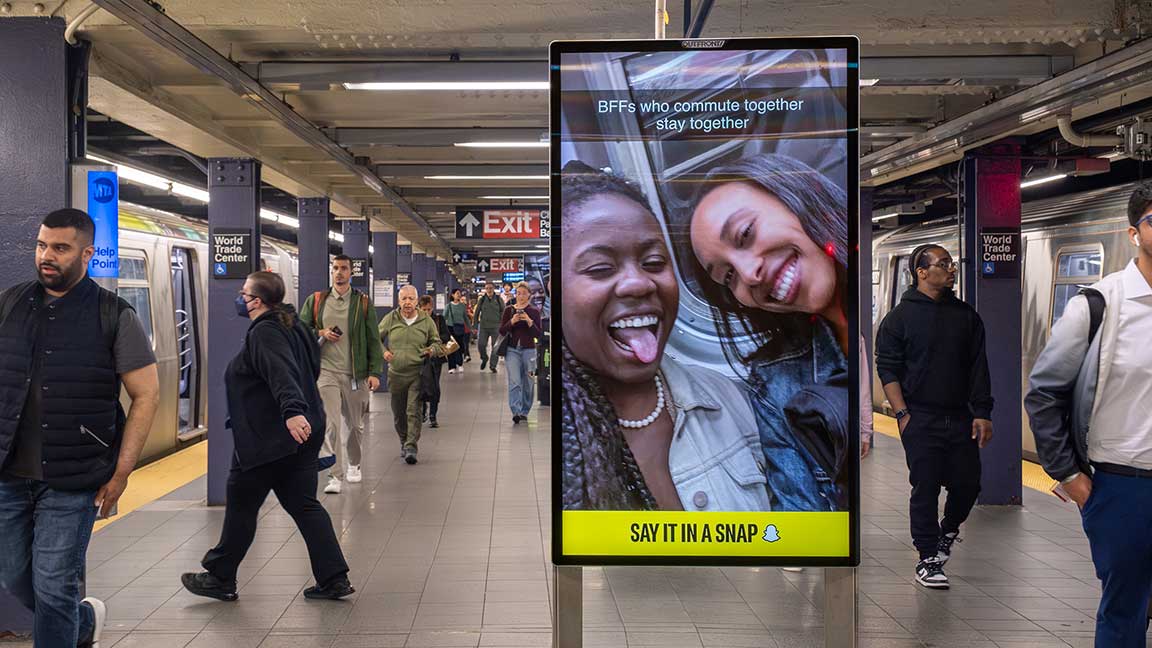 Snapchat ad on Digital Liveboard in New York City 42nd Street Shuttle station