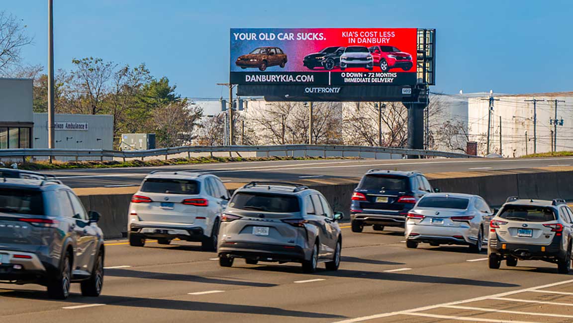 Digital bulletin alongside Connecticut highway advertising Danbury Kia