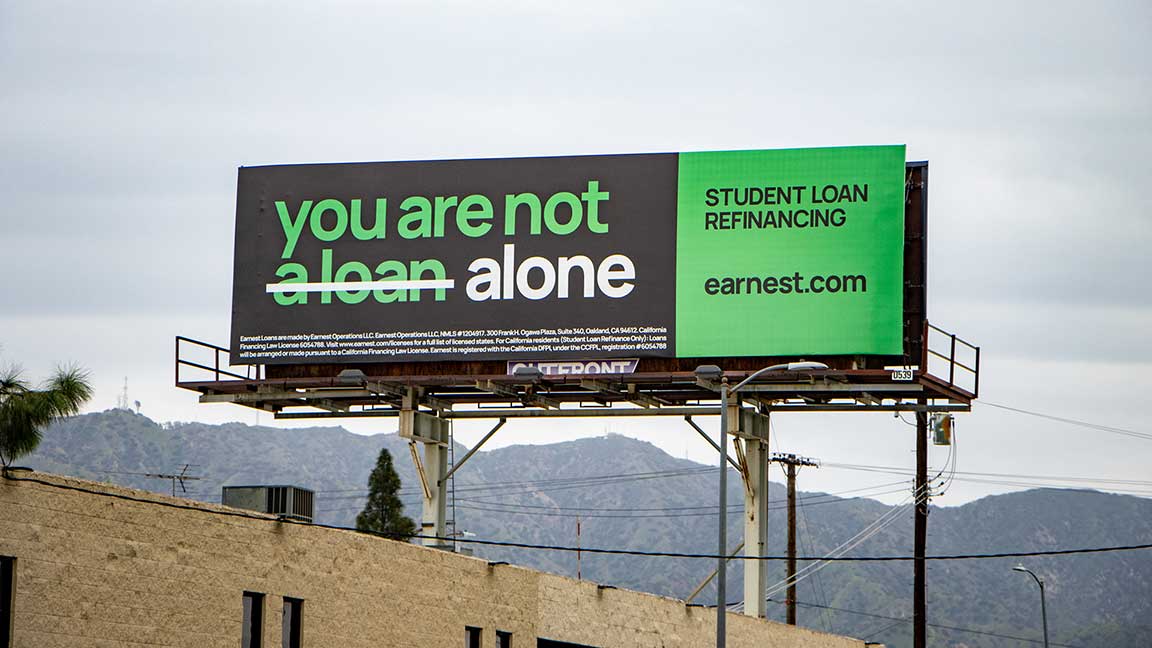 Earnest advertisement with “you are not a loan/alone” tagline