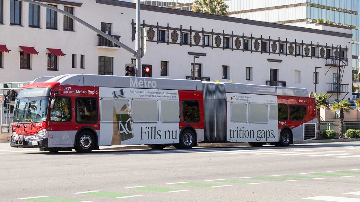 Contextually relevant OOH ad for Athletic Greens on Los Angeles bus