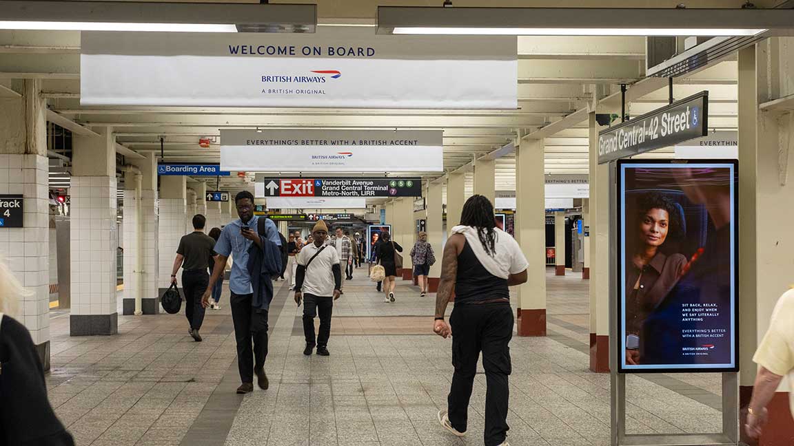 British Airways campaign on digital Liveboards and hanging banners at Grand Central-42nd Street Subway Station