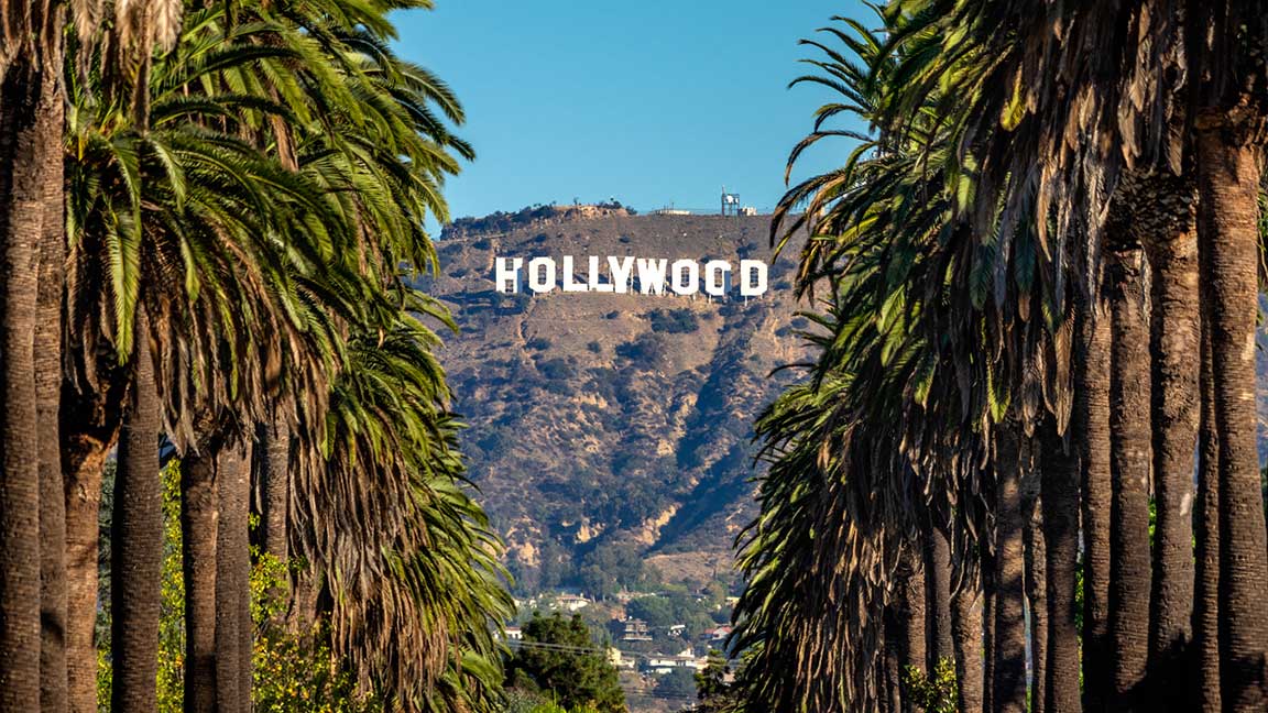 Hollywood sign as viewed from below on Windsor Blvd. Photo by Eloi_Omella via Getty Images