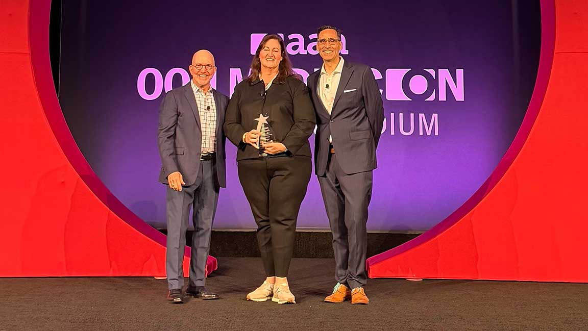 Laurie Clark accepts Local Case Study Award at OAAA OOH Media Conference