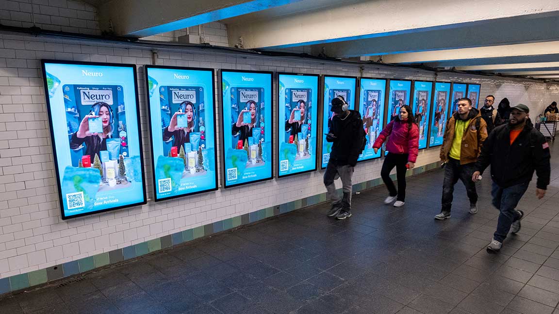 Neuro advertises new functional gum products on Digital Livescape inside Times Square-Port Authority-42nd Street subway station