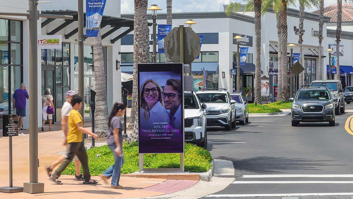 Lenscrafters ad on Digital Kiosk at Wiregrass Mall in Tampa