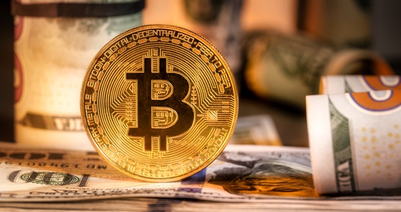 bitcoin with rolled US dollar