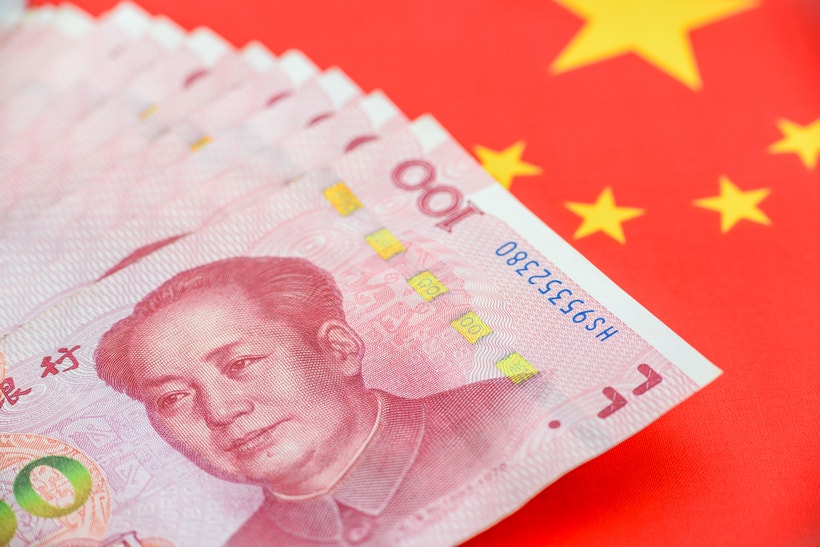 One hundred CNY Chinese yuan bill with a flag of China