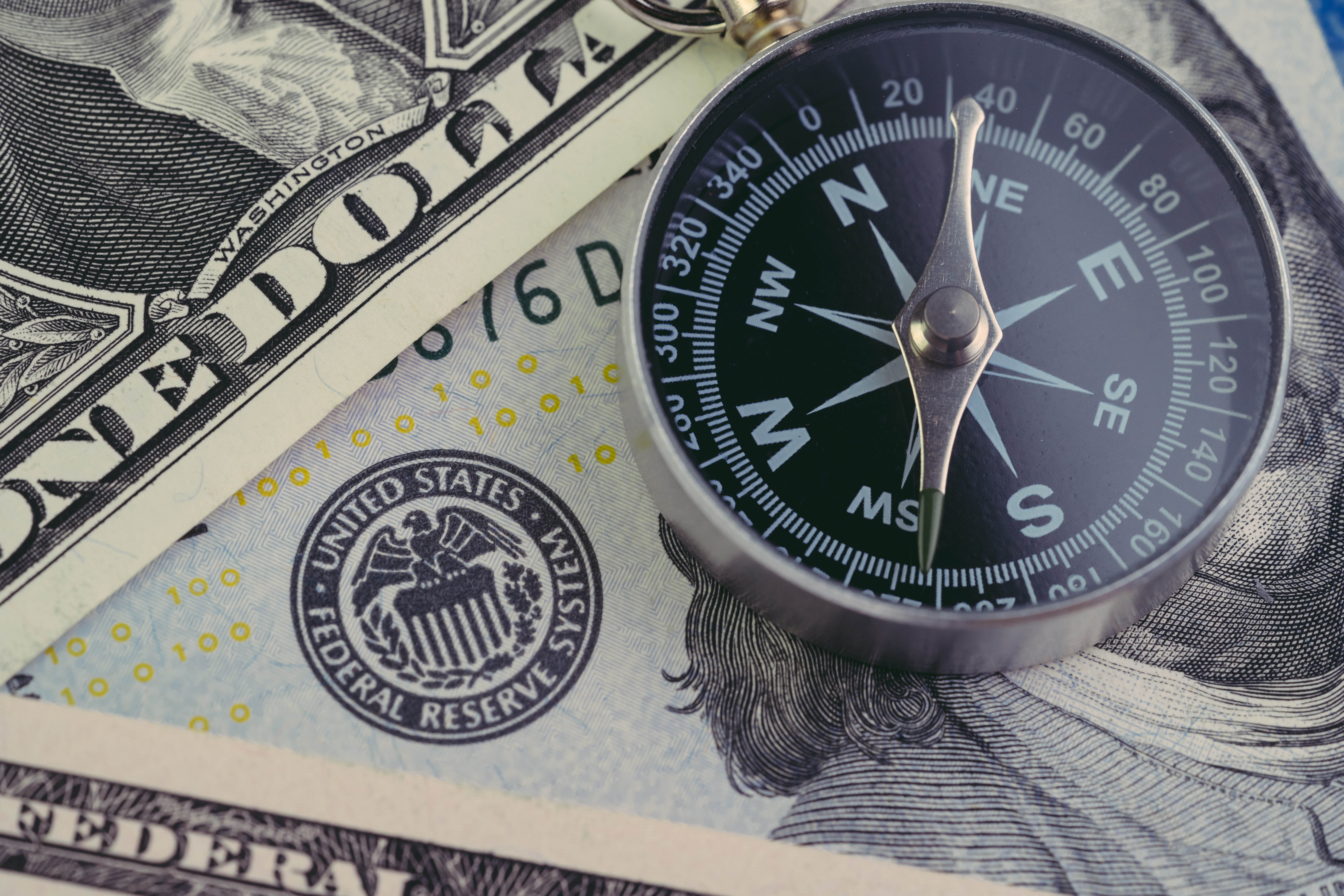 dollar with compass