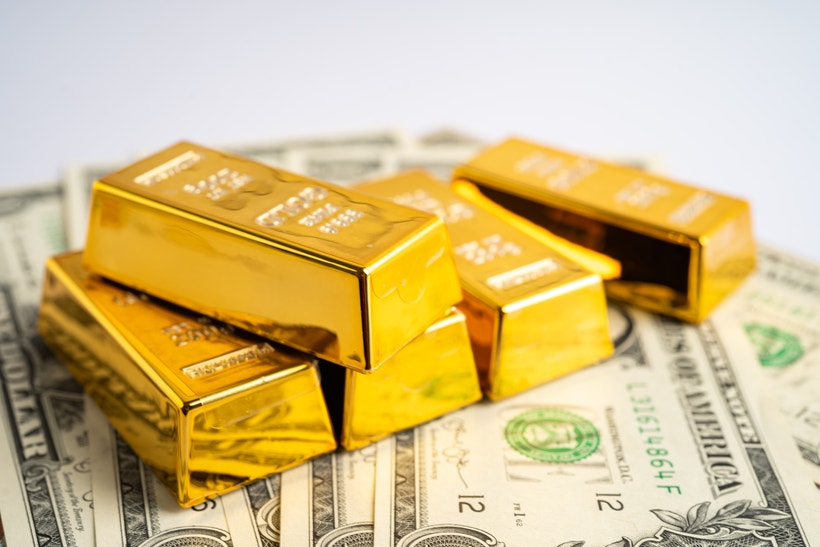 Gold bars on US dollars
