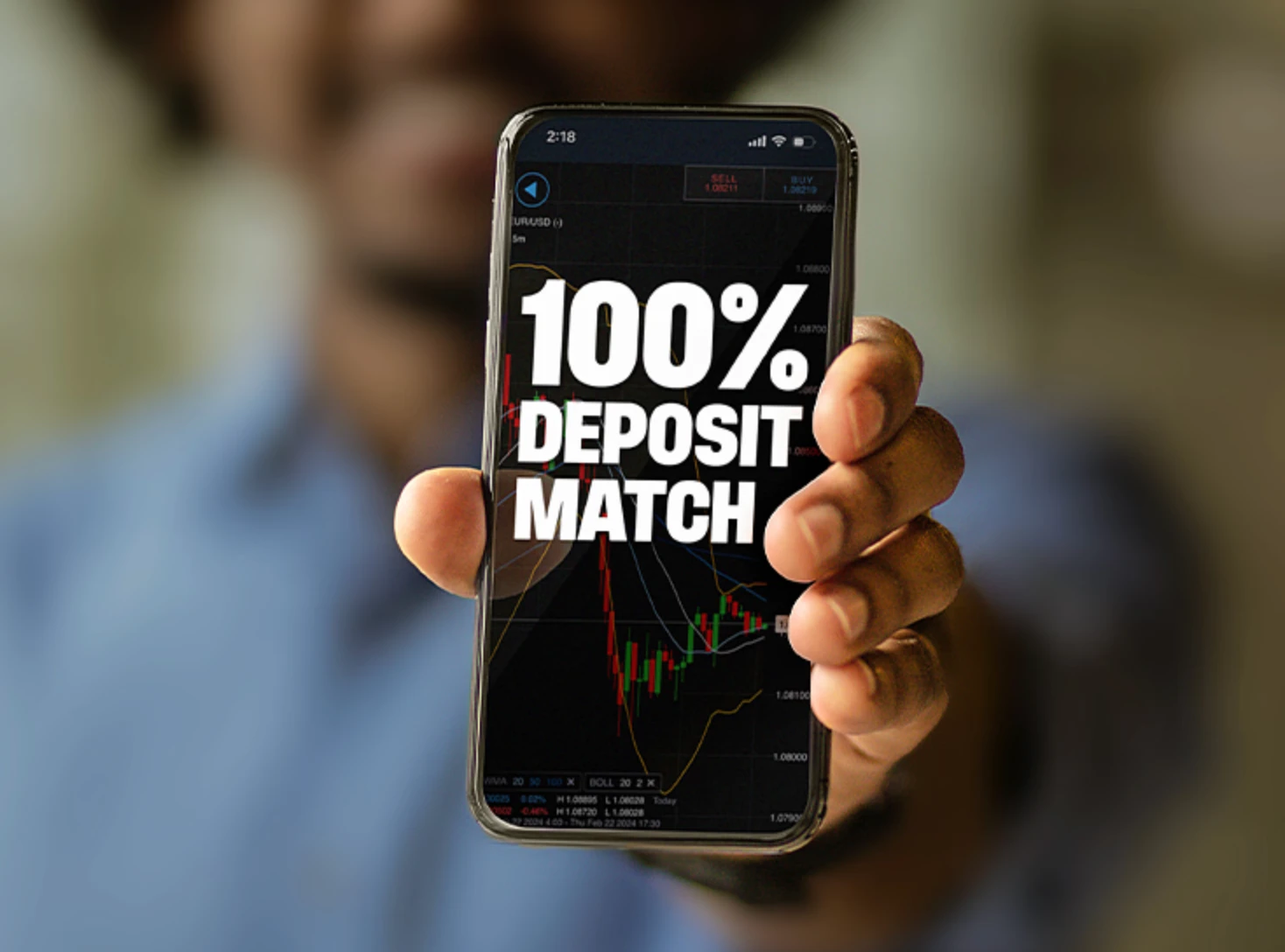 Man holding phone displaying cash bonus up to $10k
