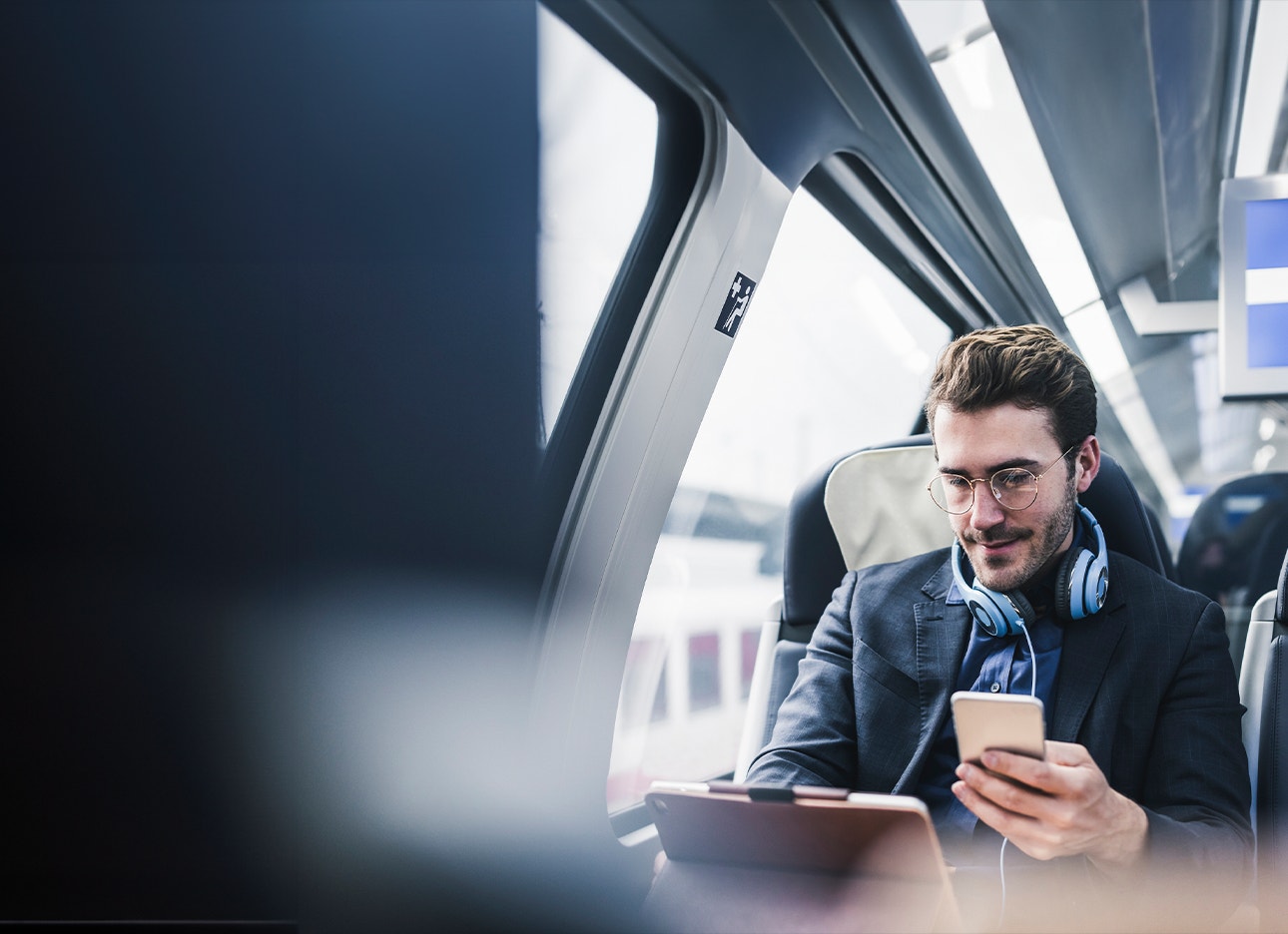 Man looking down at phone